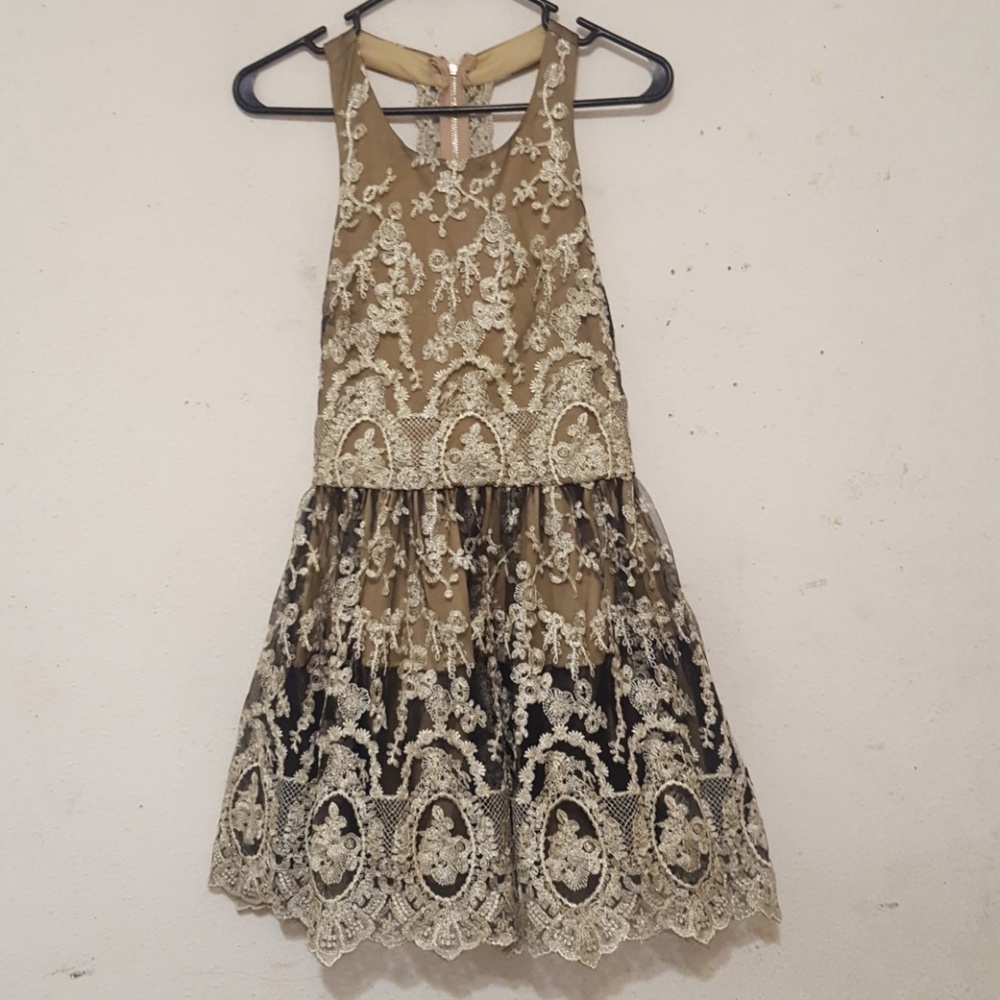 Black and gold lace dress
